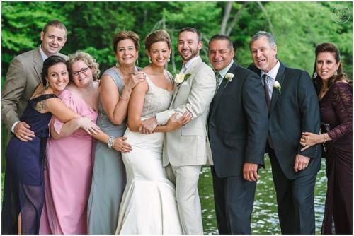 Bride and groom with their family