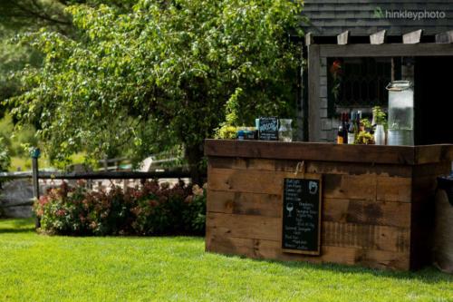Our rustic plank bar was set up outside