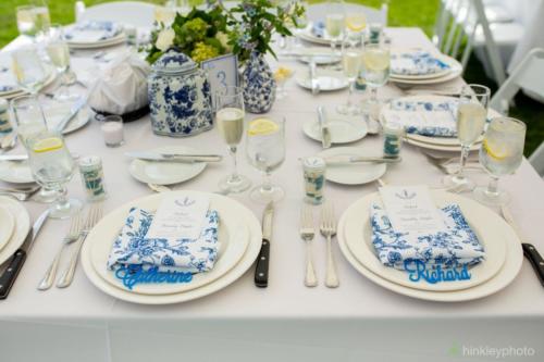 Mix of square and round tables with blue and white details