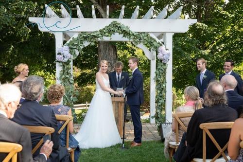 Ceremony on the lawn at The Inn at Pleasant Lake