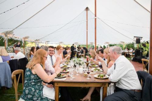 Farm tables and sailcloth tent